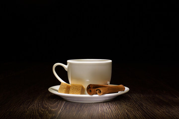 Coffee beans and white cup