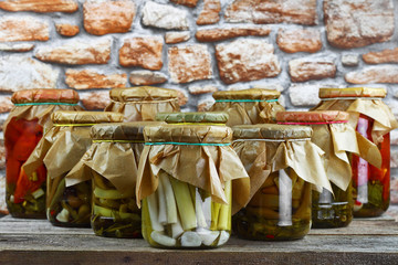 Jars with vegetables arranged