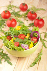 Fresh salad with tomatoes pepper and onions