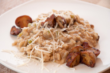 Delicious mushroom risotto served with cheese