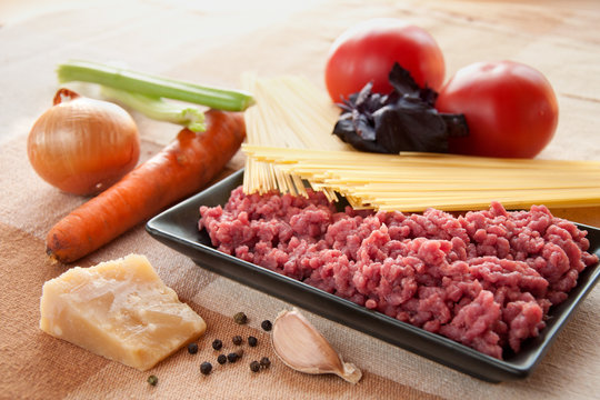 Ingredients for spaghetti bolognese with cheese