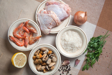 Ingredients for Paella ready meal with shrimp, chicken