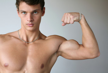 Muscular Man Flexing His Biceps