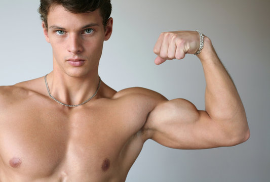 Muscular Man Flexing His Biceps