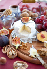 Cheese, bread and autumn fruit