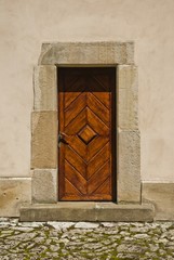 Fototapeta premium Old wooden door in castle