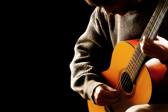 Guitarist musician acoustic guitar playing