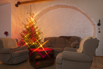 Living room and shiny lighted christmas tree