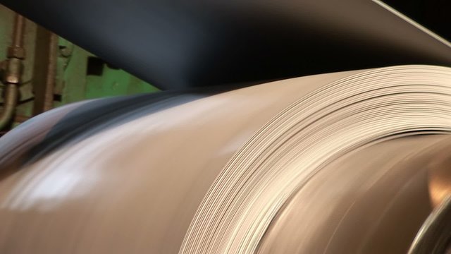 Drum with a polymer coating for metal roll sheet