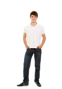 A full-length portrait of a young man, isolated on white