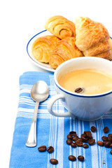Breakfast with coffee and croissant on white background