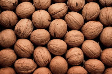 group of walnuts as background