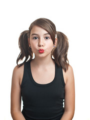 A beautiful teen girl in black top with pigtails .Portrait smili