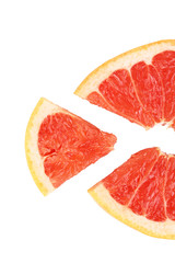 Slice of grapefruit isolated on white
