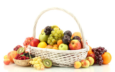 Assortment of exotic fruits and berries in baskets isolated