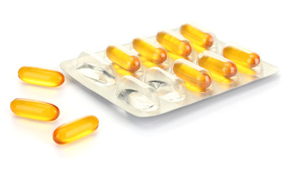 Capsules packed in blister, isolated on white