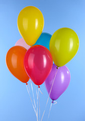 colorful balloons on blue background