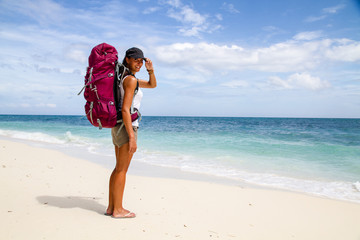 Backpacker on beach