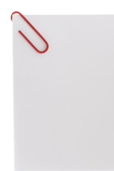 colorful paperclip on white paper