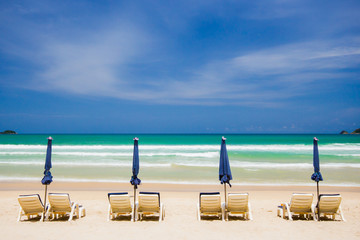 beach chairs on sand beach