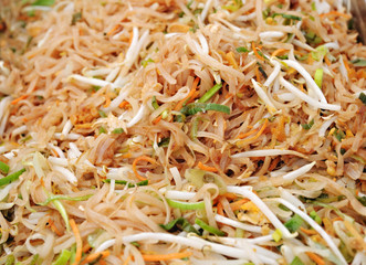 Thai noodles with onion, carrot and soybean sprouts