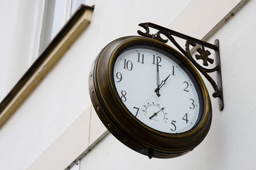 Retro clock on a white wall
