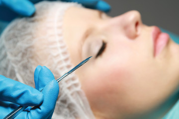 A plastic surgery, focus on scalpel