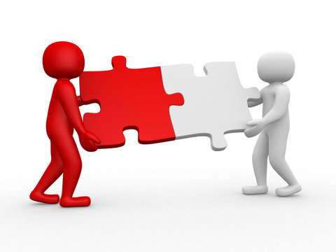 Two person matching puzzle pieces