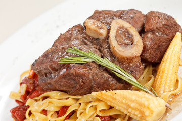 tasty steak with pasta