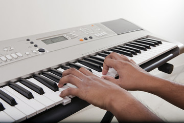 Musician playing electronic piano