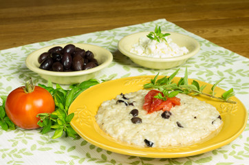 Kalamata olive risotto with tomatoes and herbs