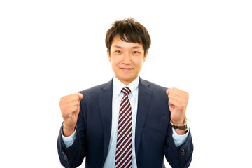 ガッツポーズのビジネスマン