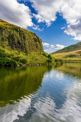Fototapeta na wymiar Beautiful views of the hill and lake in Scotland in summer
