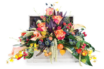 colorful floral arrangement of roses, lilies, freesia and irises