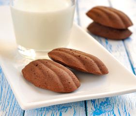 Madeleine cookies on a blue table