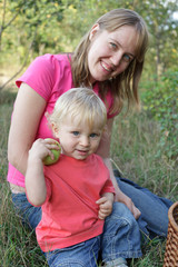 family picking apples