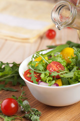 Fresh salad with tomatoes pepper and onions