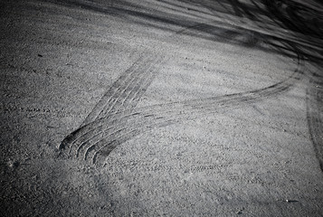 Rroad background with crossing of tires tracks