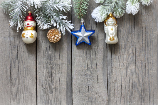 Christmas tree baubles background on vintage wooden boards
