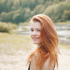 Naklejka premium portrait of a beautiful red-haired girl