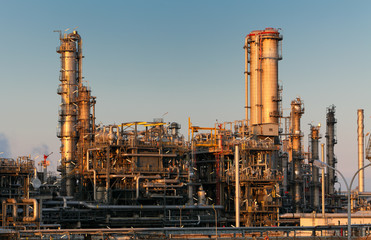 Petrochemical oil and gas refinery plant in night