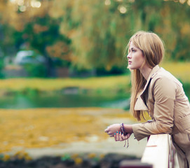 beautiful girl sitting in the park