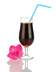 glass with cocktail and gladiolus bud isolated on white
