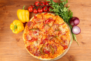 Tasty pepperoni pizza with vegetables