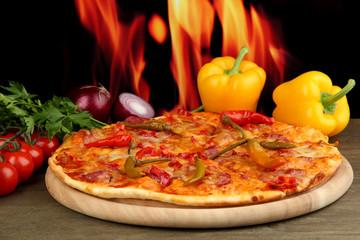 Tasty pepperoni pizza with vegetables