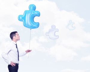 business concept homme avec puzzle