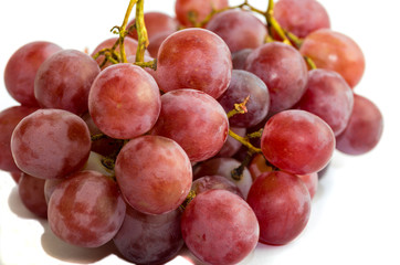 Red grapes isolated on white