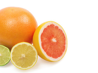 Image of a fresh whole lime, lemon and orange isolated on white