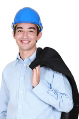 Young architect holding jacket over shoulder