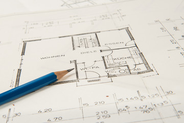Bauplan Einfamilienhaus mit Bleistift